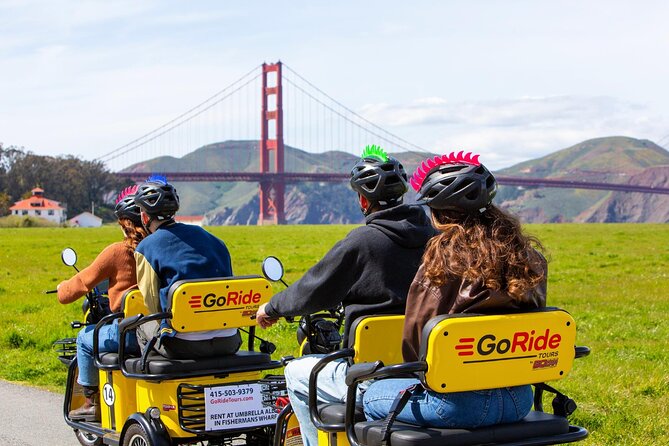 Wharf to Golden Gate Bridge - GoRide Electric Scooter Rentals - The Start at Umbrella Alley: Quick Setup, Helmet On, Then Go